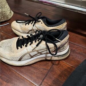 ASICS gel nimbus 21 gold tennis shoes